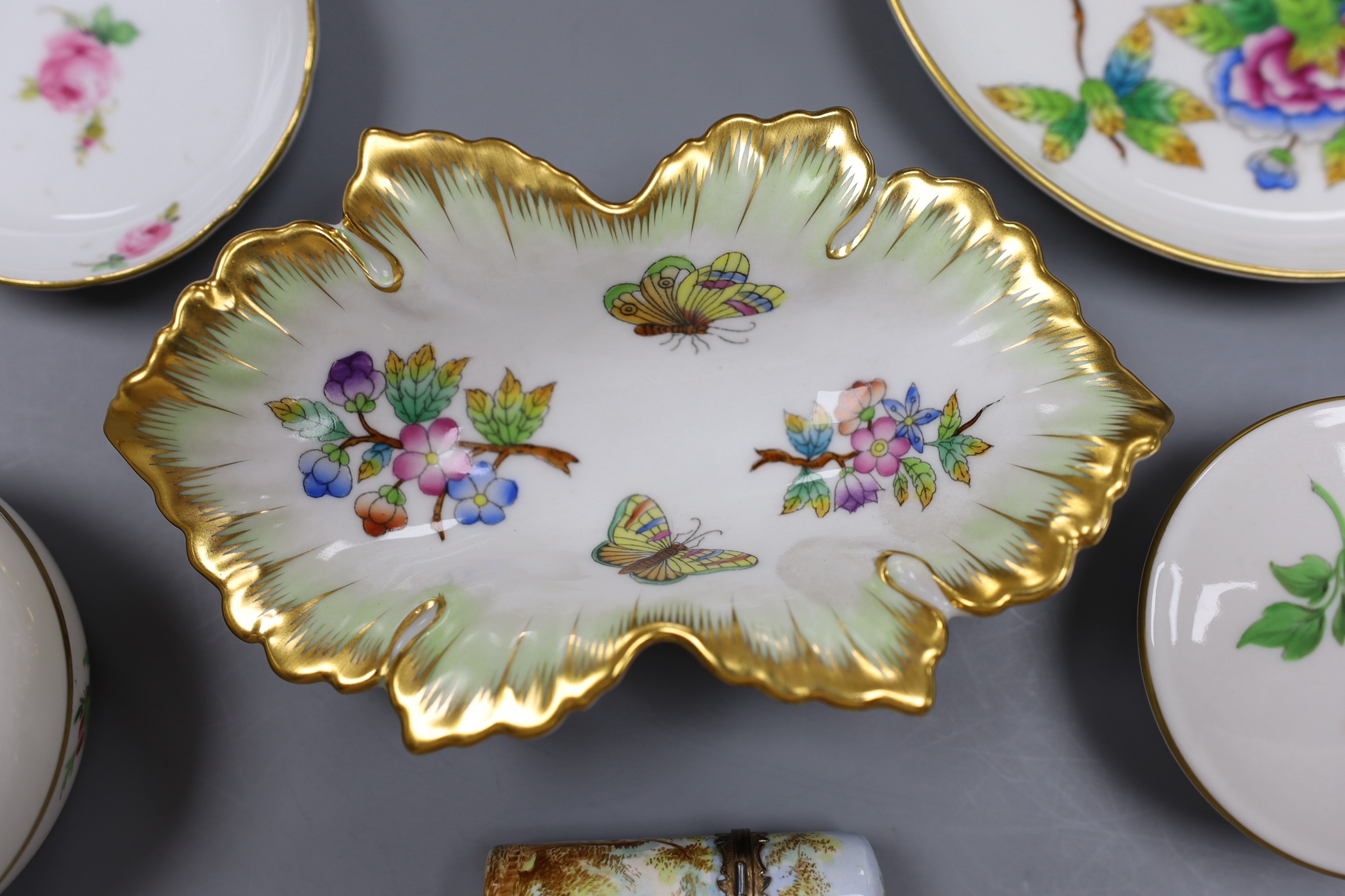 Two Meissen boxes with covers and a dish, two Herend dishes and an enamel on copper scent bottle